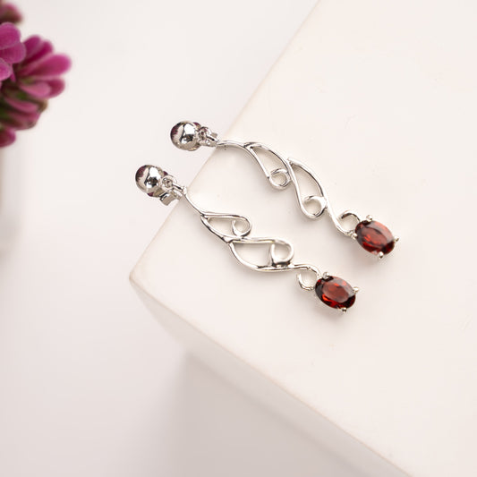 Elegant Swirl Drop Earrings with Garnet Gemstones