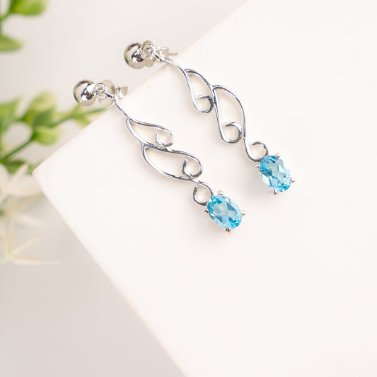 Elegant Swirl Drop Earrings with Blue Topaz Gemstones
