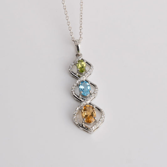 Trio Harmony Pendant – Citrine, Blue Topaz & Peridot Elegance