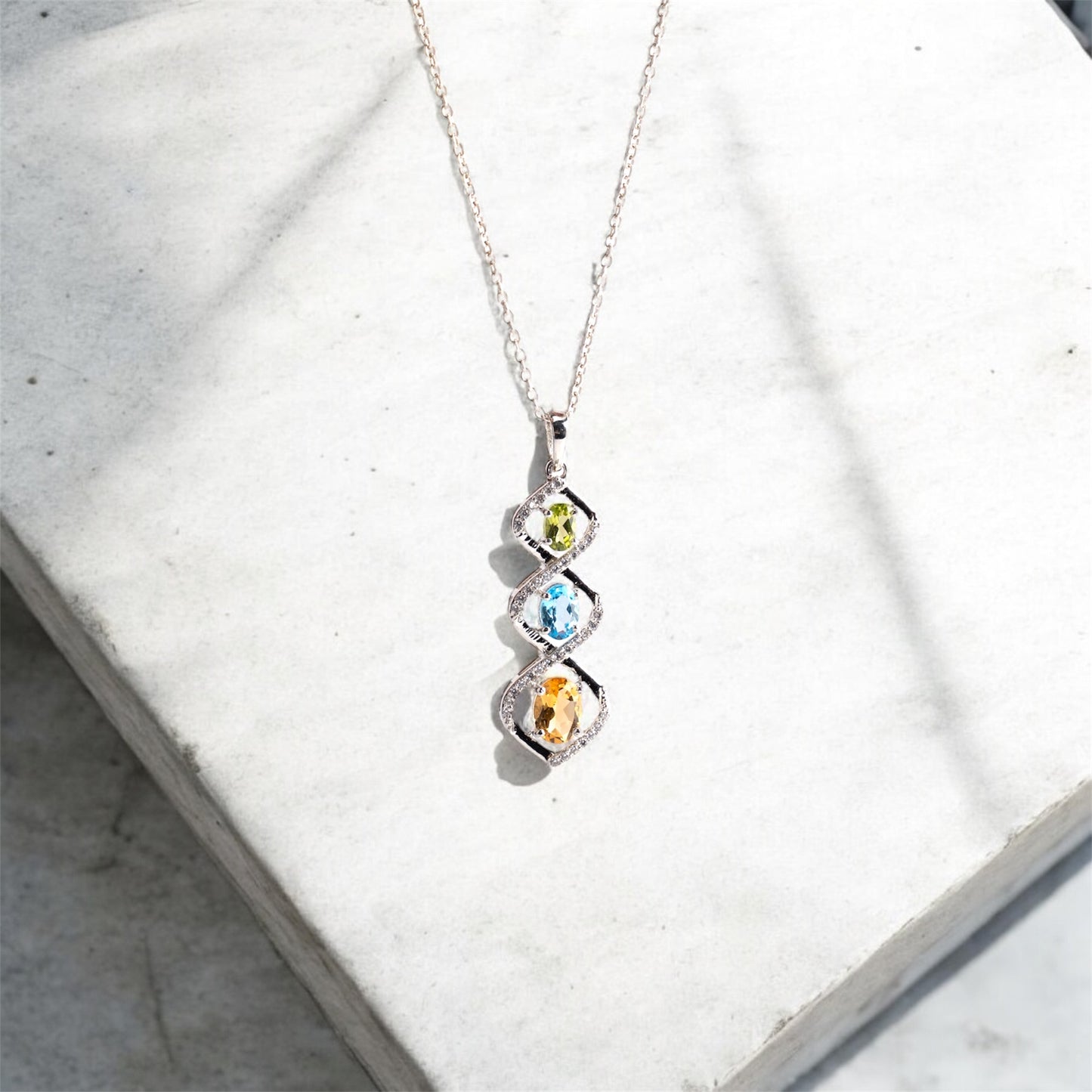 Trio Harmony Pendant – Citrine, Blue Topaz & Peridot Elegance