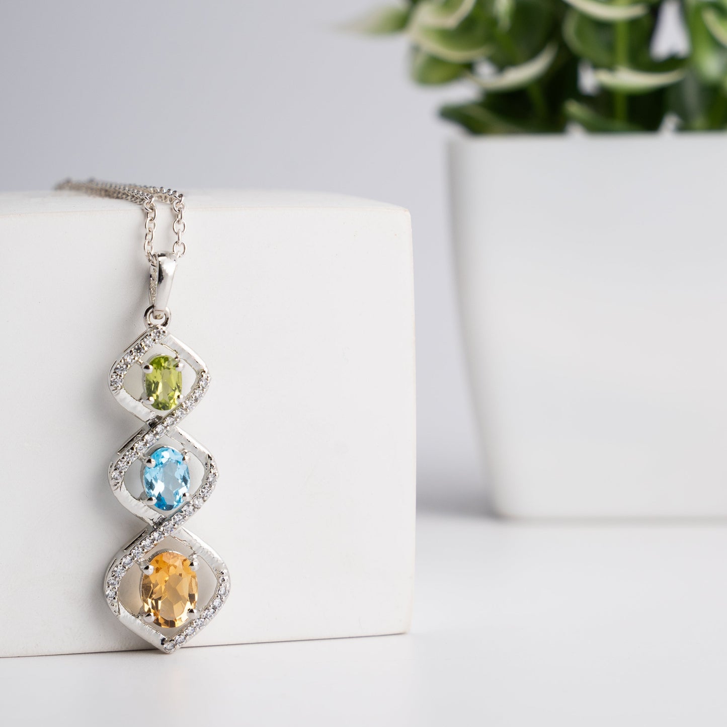 Trio Harmony Pendant – Citrine, Blue Topaz & Peridot Elegance