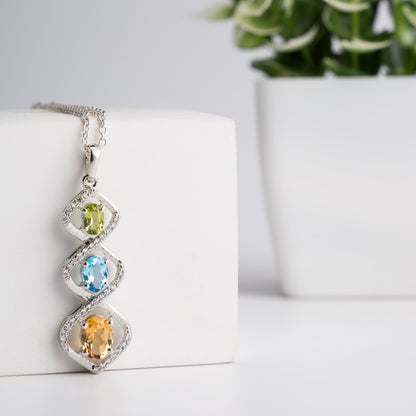 Trio Harmony Pendant – Citrine, Blue Topaz & Peridot Elegance