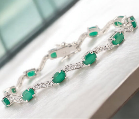Elegant Silver Bracelet with Oval Green Onyx and Cubic Zirconia Accents