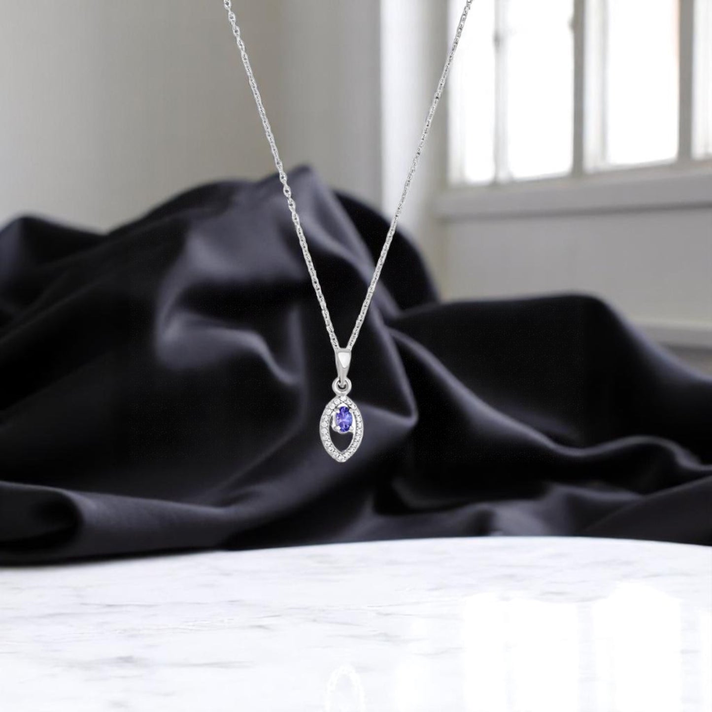 Lavender Tanzanite Sparkle Pendant in Silver Halo Setting