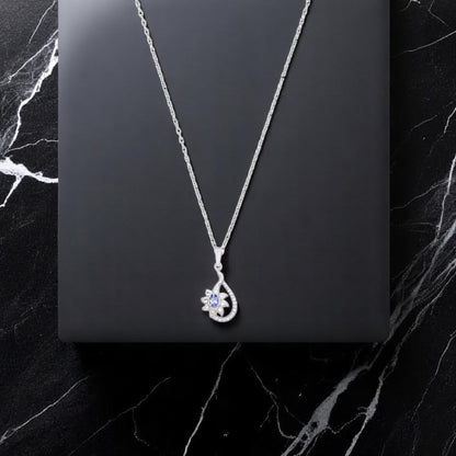 Luxe Violet Tanzanite Floral Teardrop Pendant with White Cubic Zirconia Accents
