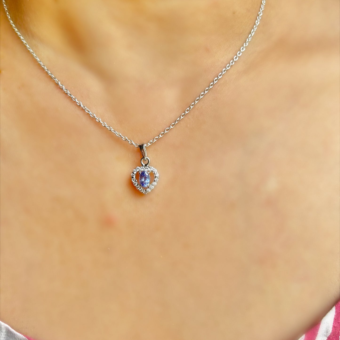 Heart-Shaped Sterling Silver Pendant with Blue Tanzanite and Sparkling Cubic Zirconia