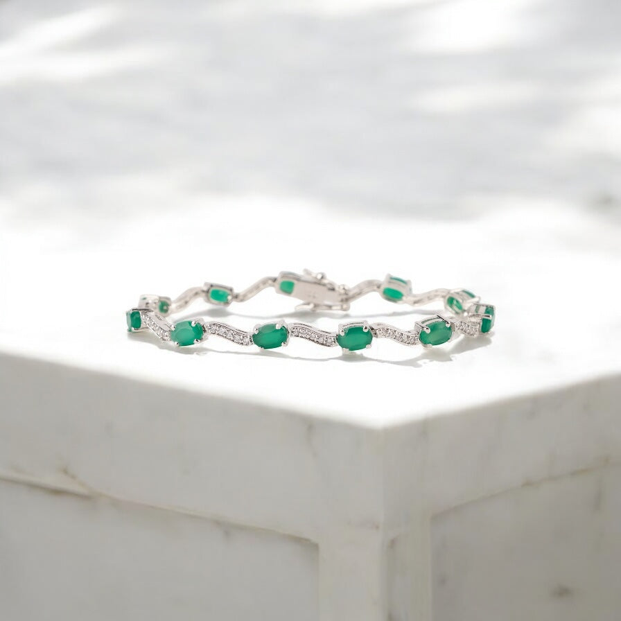 Elegant Silver Bracelet with Oval Green Onyx and Cubic Zirconia Accents