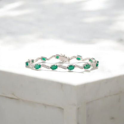 Elegant Silver Bracelet with Oval Green Onyx and Cubic Zirconia Accents