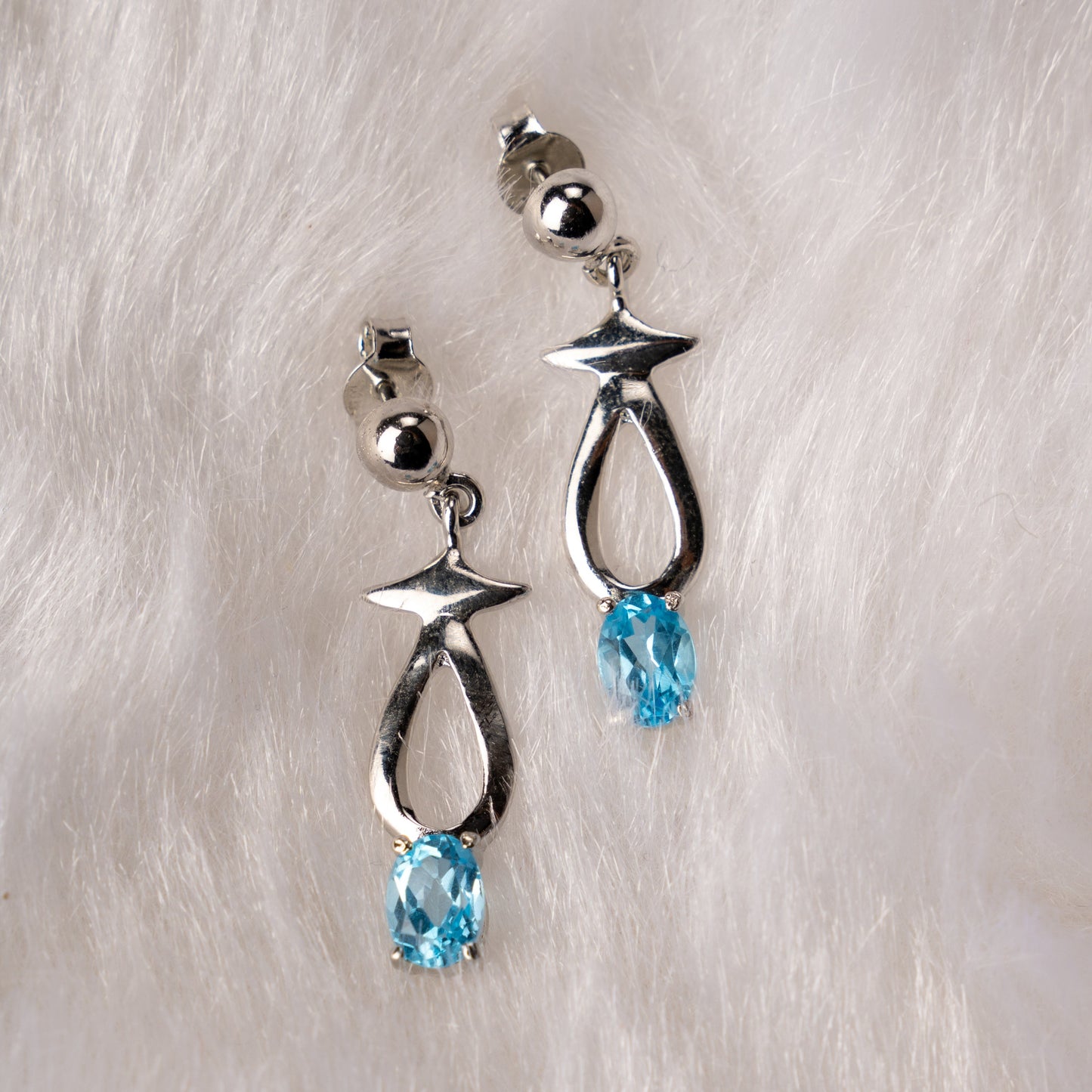 Ocean Spark Blue Topaz Teardrop Silver Earrings