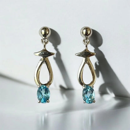 Ocean Spark Blue Topaz Teardrop Silver Earrings