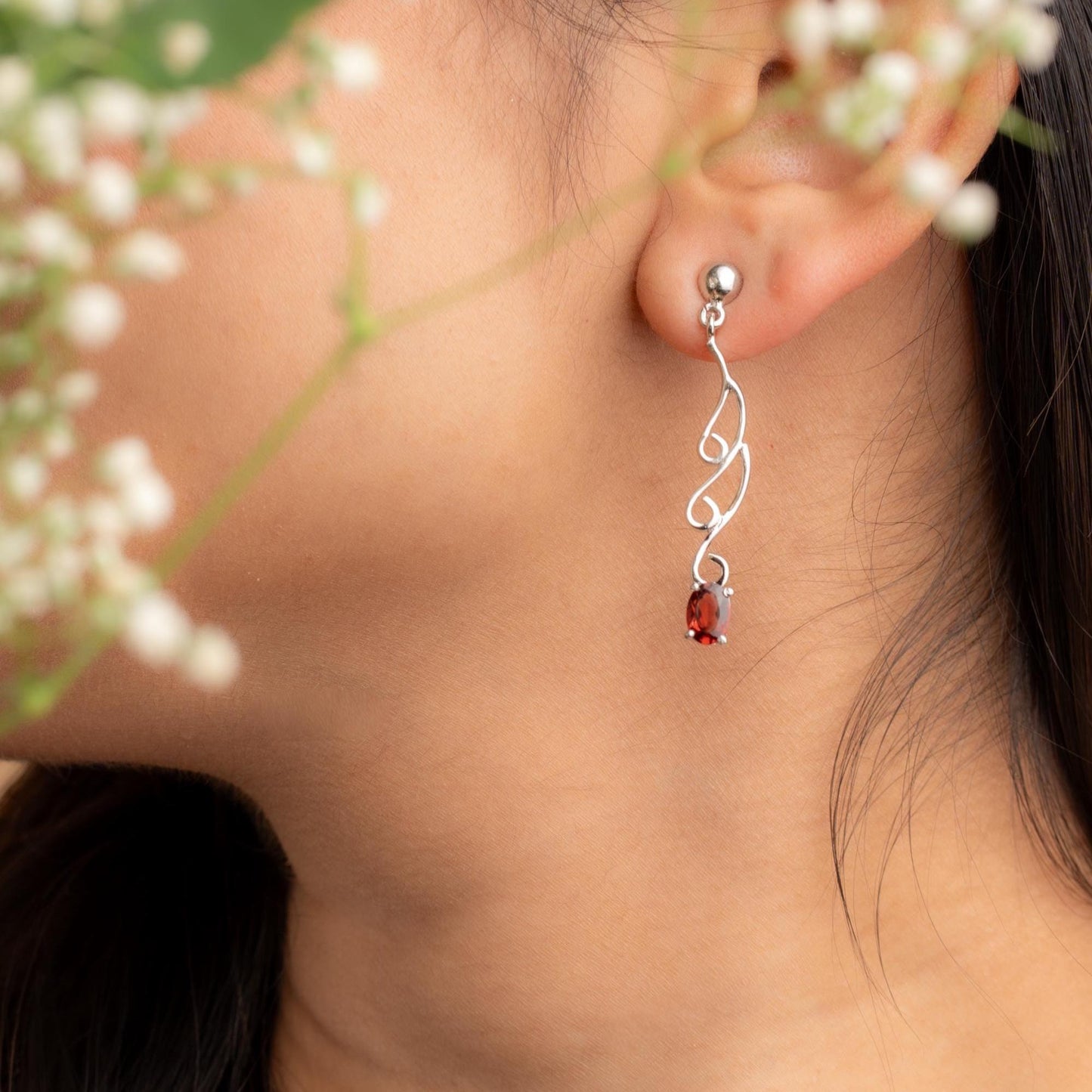 Elegant Swirl Drop Earrings with Garnet Gemstones