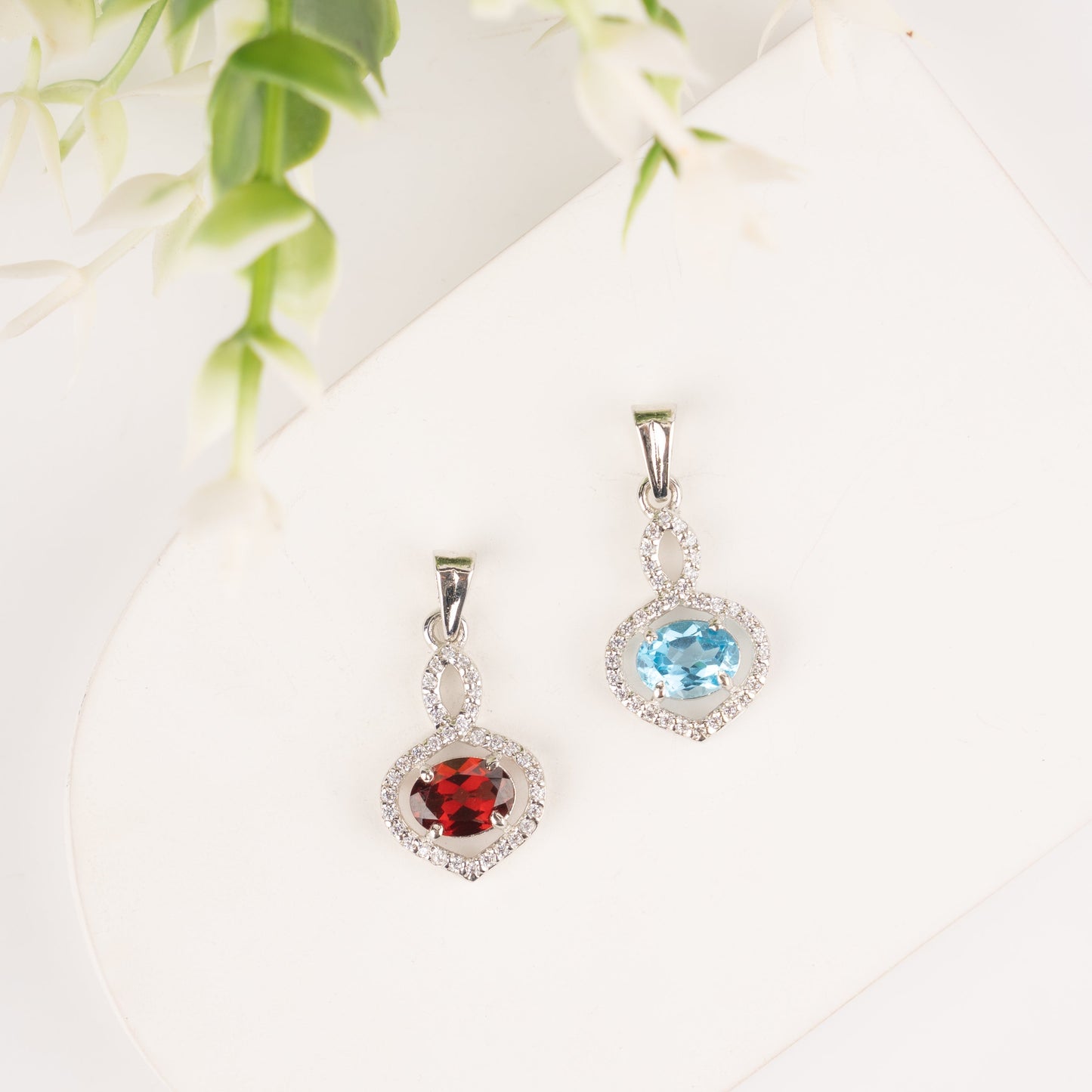 Stunning Garnet / Blue Topaz in Sterling Silver with Zircon Accents