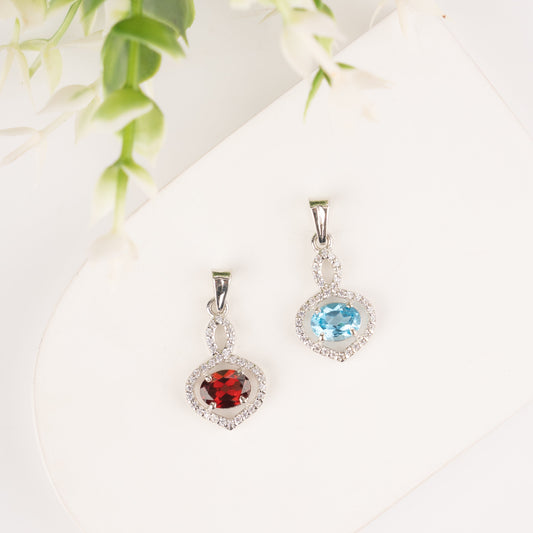 Stunning Garnet / Blue Topaz in Sterling Silver with Zircon Accents