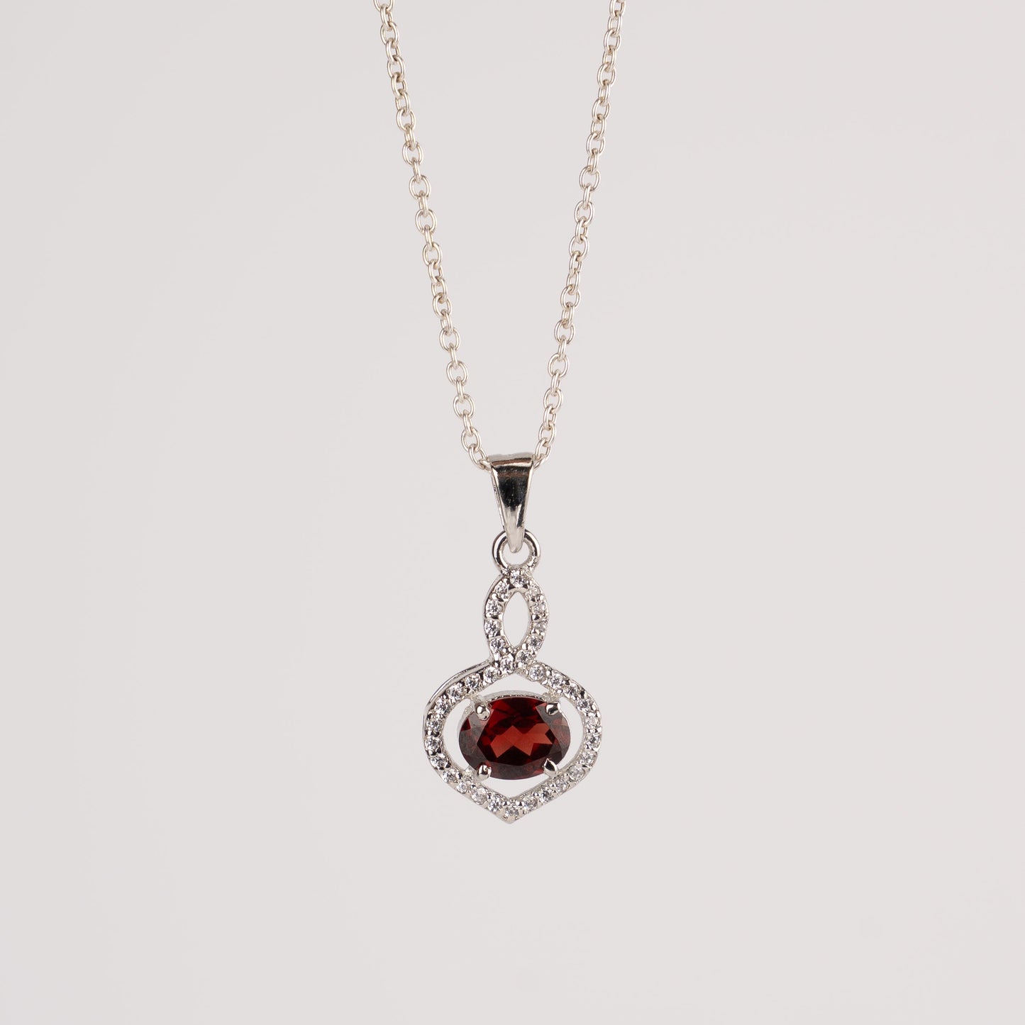 Stunning Garnet / Blue Topaz in Sterling Silver with Zircon Accents