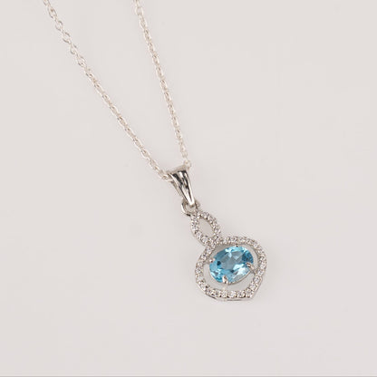 Stunning Garnet / Blue Topaz in Sterling Silver with Zircon Accents