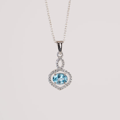 Stunning Garnet / Blue Topaz in Sterling Silver with Zircon Accents