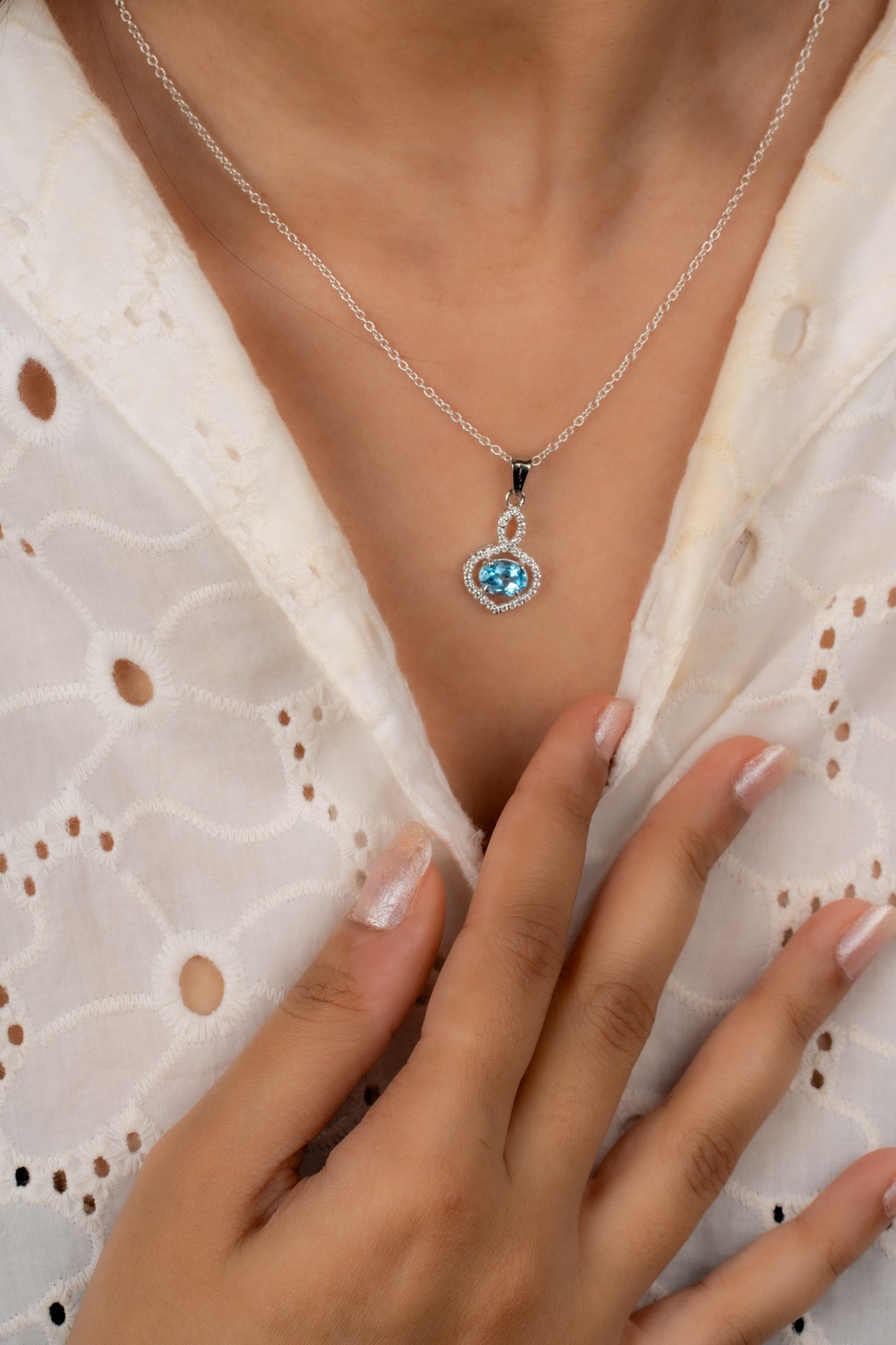 Stunning Garnet / Blue Topaz in Sterling Silver with Zircon Accents