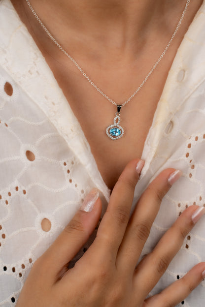 Stunning Garnet / Blue Topaz in Sterling Silver with Zircon Accents