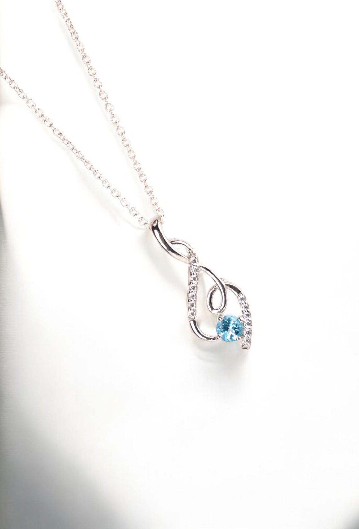 Graceful Twist Gemstone Pendants in Sterling Silver – Garnet, Citrine & Blue Topaz