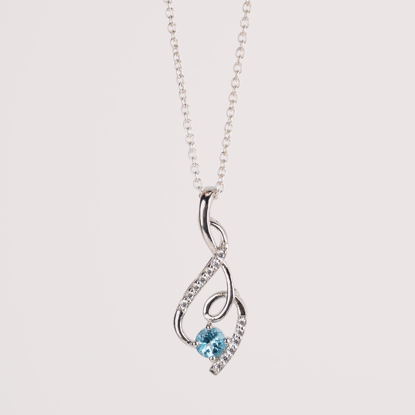 Graceful Twist Gemstone Pendants in Sterling Silver – Garnet, Citrine & Blue Topaz