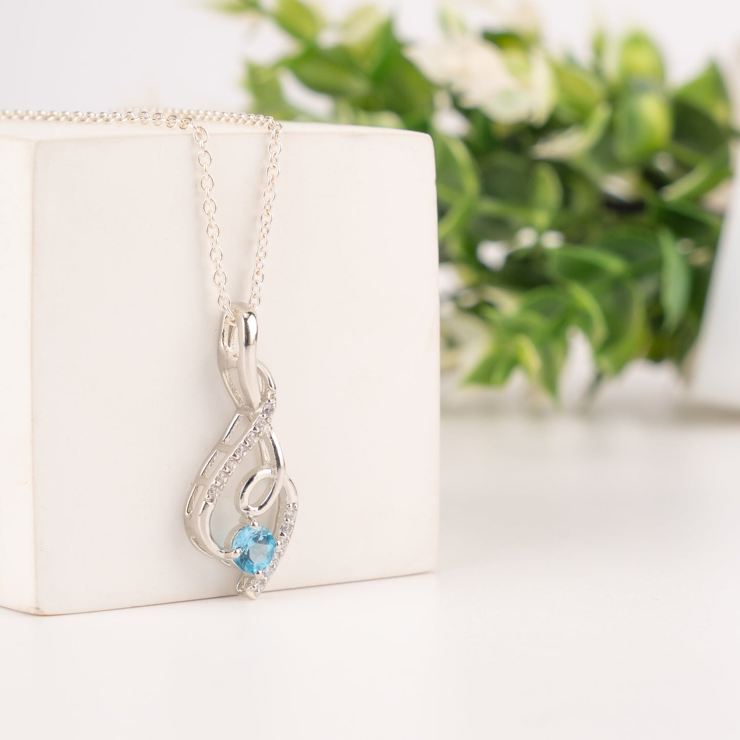 Graceful Twist Gemstone Pendants in Sterling Silver – Garnet, Citrine & Blue Topaz