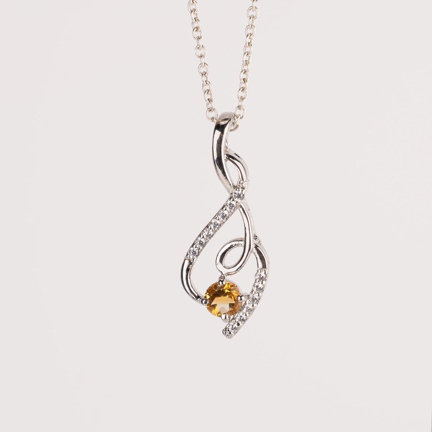 Graceful Twist Gemstone Pendants in Sterling Silver – Garnet, Citrine & Blue Topaz