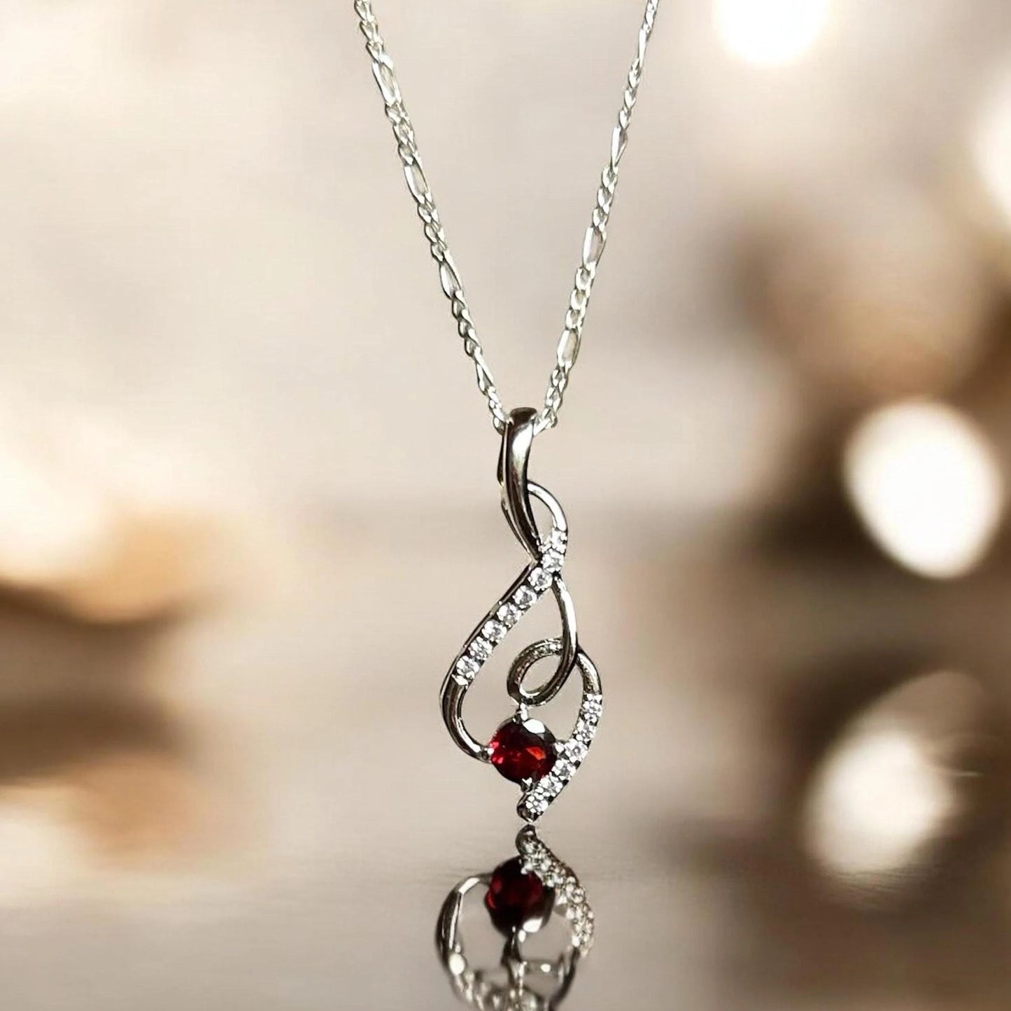 Graceful Twist Gemstone Pendants in Sterling Silver – Garnet, Citrine & Blue Topaz