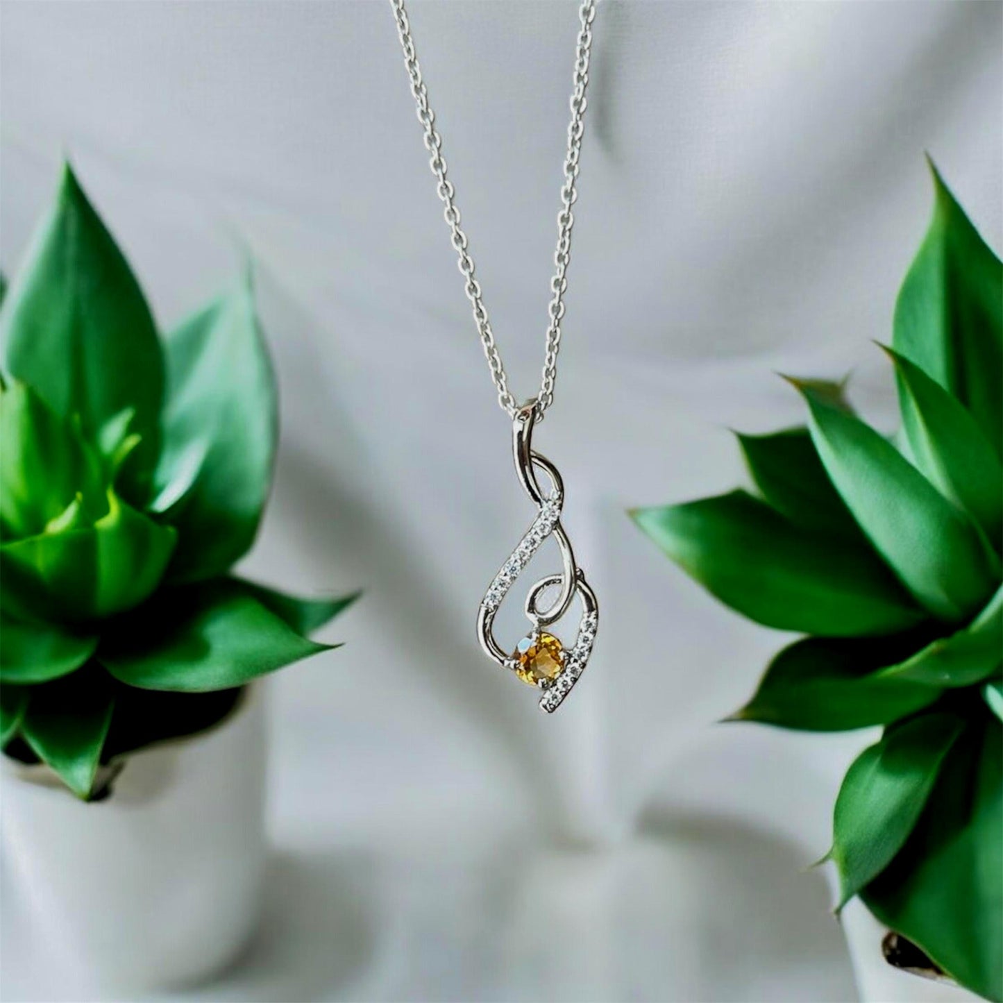 Graceful Twist Gemstone Pendants in Sterling Silver – Garnet, Citrine & Blue Topaz
