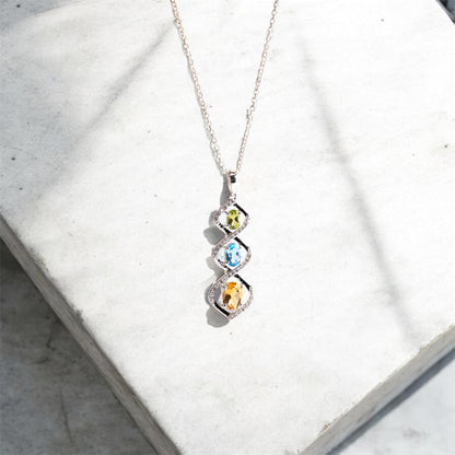 Trio Harmony Pendant – Citrine, Blue Topaz & Peridot Elegance