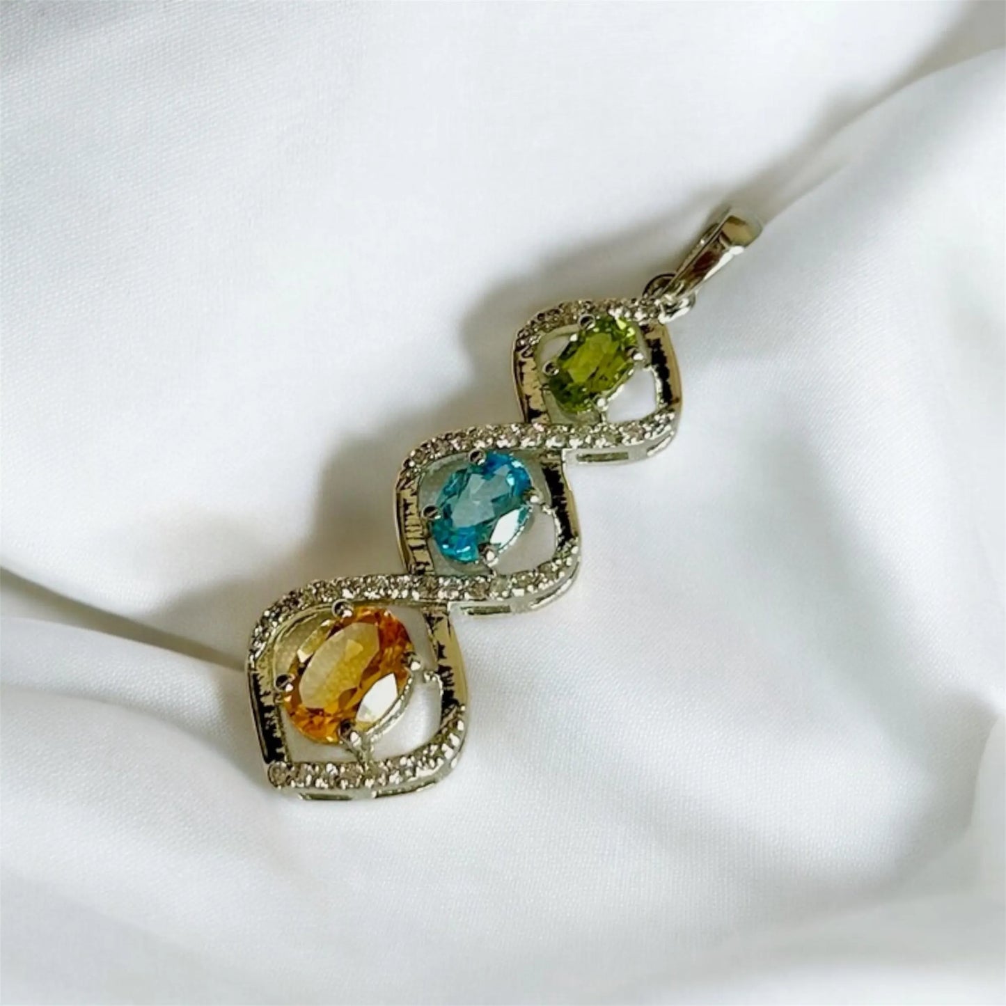 Trio Harmony Pendant – Citrine, Blue Topaz & Peridot Elegance
