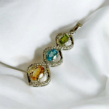 Trio Harmony Pendant – Citrine, Blue Topaz & Peridot Elegance